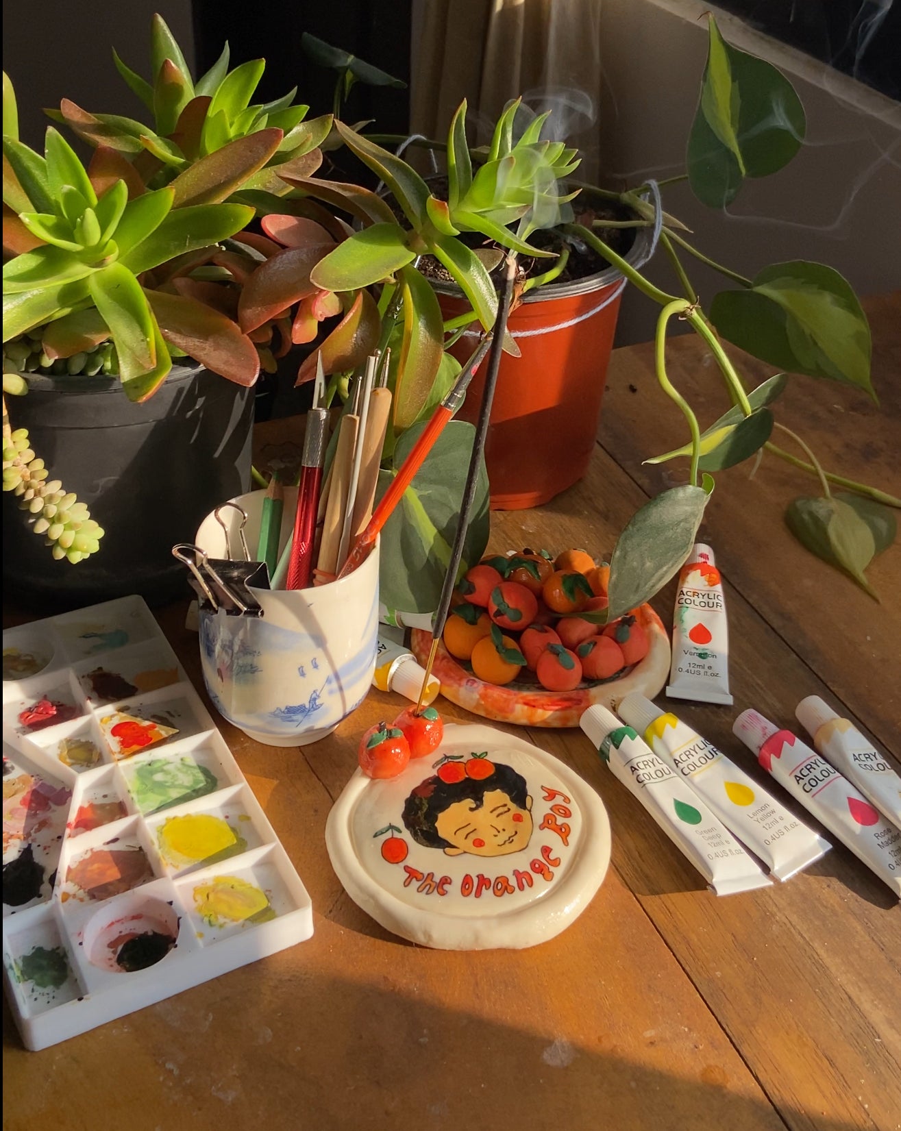 The orange boy trinket dish / incense holder
