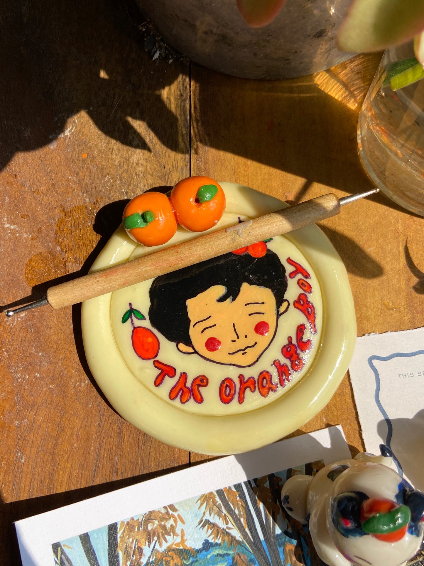 The orange boy trinket dish / incense holder
