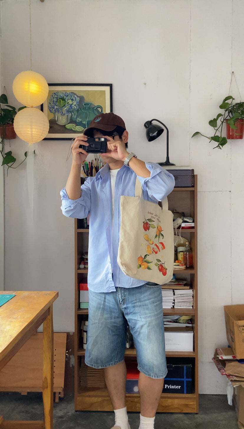 The orange boy Tote bag